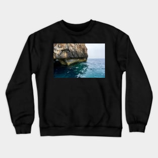 Steep cliff leading to Mediterranean Sea Crewneck Sweatshirt